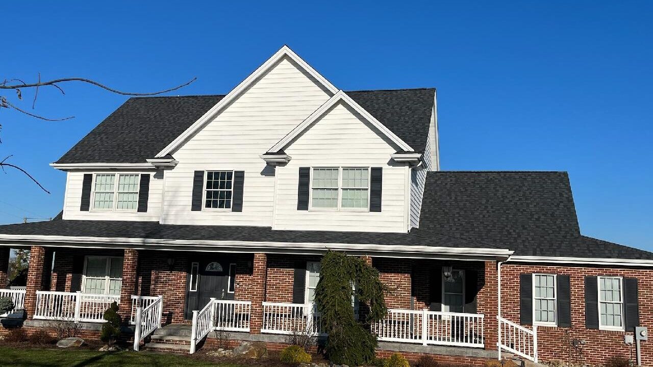 This house in Zelienople, PA was transformed into a beautiful property with an updated, new roof. Our roofers installed Landmark Pro shingles from CertainTeed. 