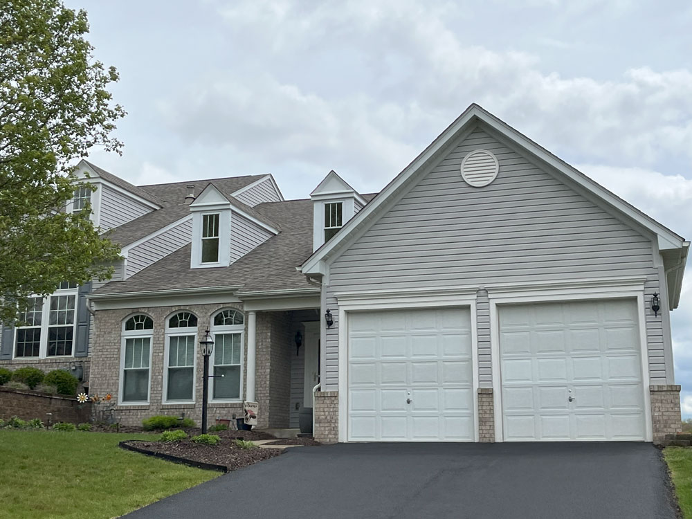 This house in Whitehall Township, PA was transformed into a beautiful property with an updated, new roof. Our roofers installed Landmark Pro shingles from CertainTeed. 