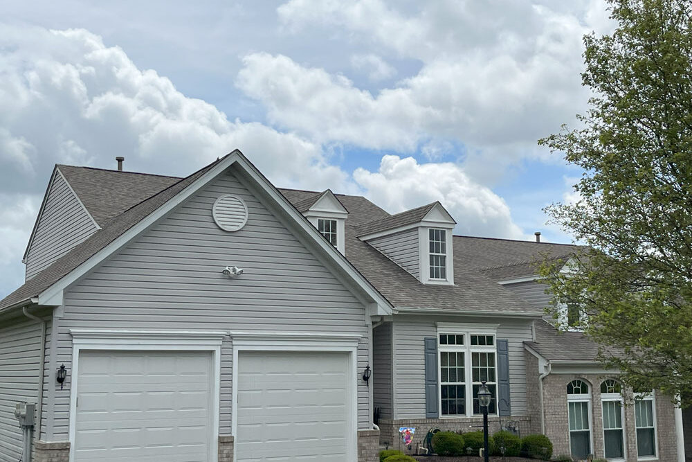 This house in Hendersonville, PA was transformed into a beautiful property with an updated, new roof. Our roofers installed Landmark Pro shingles from CertainTeed. 