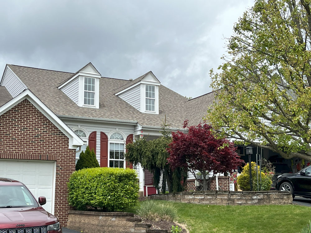 This house in Bellevue, PA was transformed into a beautiful property with an updated, new roof. Our roofers installed Landmark Pro shingles from Certainteed.