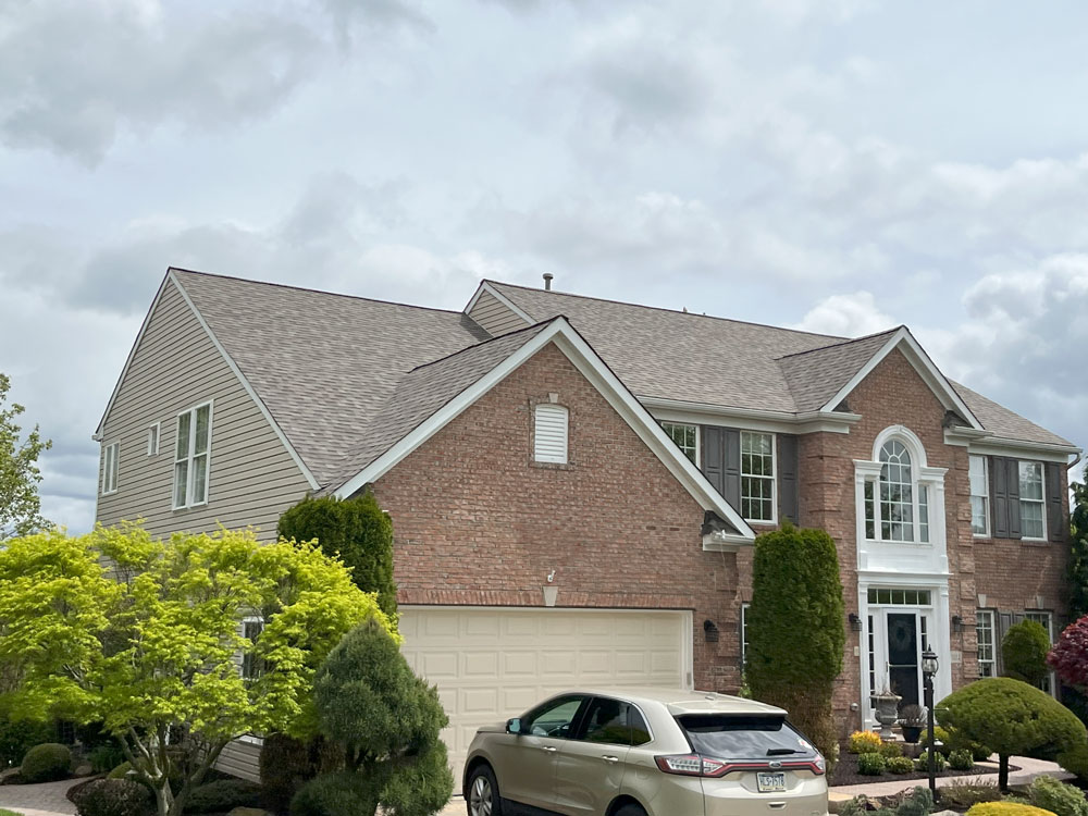 This house in Blawnox, PA was transformed into a beautiful property with an updated, new roof. Our roofers installed Landmark Pro shingles from Certainteed.