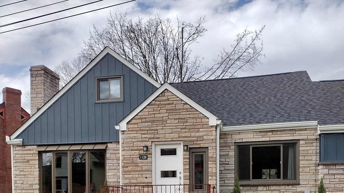 This house in Baden, PA was transformed into a beautiful property with an updated, new roof. Our roofers installed Landmark Pro shingles from CertainTeed. 