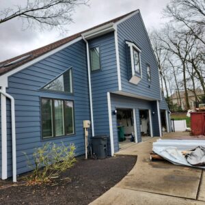 Enhance your curb appeal with help from Knox’s Construction. We offer a wide variety of professional siding in Wexford Township to increase your home’s aesthetic and overall value. Everlast siding blue.