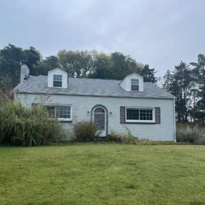 New CertainTeed Cobblestone Gray roof paired with sleek black counter flashing project in Canonsburg, PA by Knox's expert roofers. We also upgraded the backside with brand-new gutters and downspouts for improved drainage.