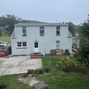 New CertainTeed Cobblestone Gray roof paired with sleek black counter flashing project in Canonsburg, PA by Knox's expert roofers. We also upgraded the backside with brand-new gutters and downspouts for improved drainage.