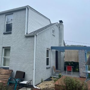 New CertainTeed Cobblestone Gray roof paired with sleek black counter flashing project in Canonsburg, PA by Knox's expert roofers. We also upgraded the backside with brand-new gutters and downspouts for improved drainage.