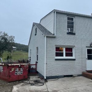New CertainTeed Cobblestone Gray roof paired with sleek black counter flashing project in Canonsburg, PA by Knox's expert roofers. We also upgraded the backside with brand-new gutters and downspouts for improved drainage.