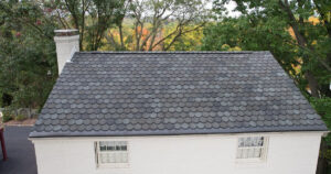 Explore stunning images of a new roof installation in Mt. Lebanon, PA, featuring CertainTeed Carriage House Stonegate Grey shingles. See the elegant slate-inspired design and superior craftsmanship up close!