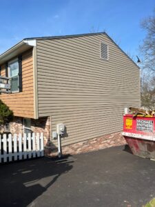 New siding installation featuring Perfection siding and Pebblestone Clay Dutch Lap siding by Knox’s Construction in Bethel Park, PA.