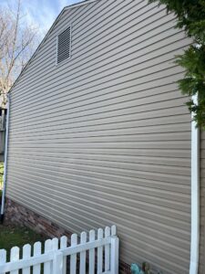 New siding installation featuring Perfection siding and Pebblestone Clay Dutch Lap siding by Knox’s Construction in Bethel Park, PA.
