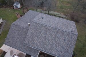 Complete exterior renovation in Bethel Park featuring Montana Suede siding and CertainTeed Pro Shingles.