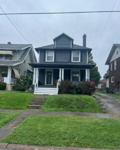 Modern Exterior Remodel in Pittsburgh Featuring Black Soffit and Slate Siding