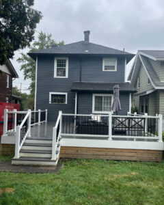 Modern Exterior Remodel in Pittsburgh Featuring Black Soffit and Slate Siding